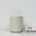 White hammered ceramic planter with glossy finish